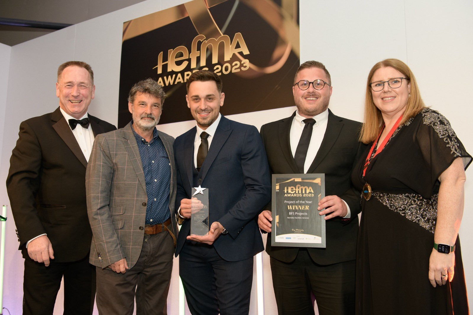 BFS staff collecting the HEFMA Award