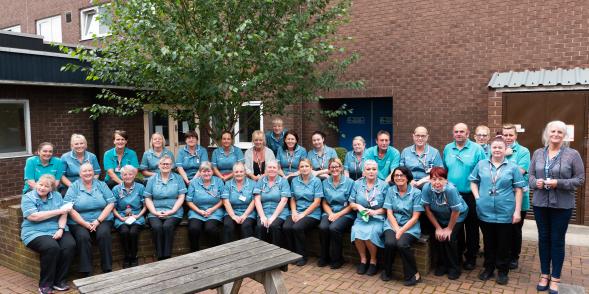 A group photo of staff who work in Barnsley Facilities Services