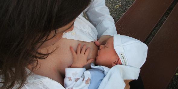 Mother breastfeeding baby