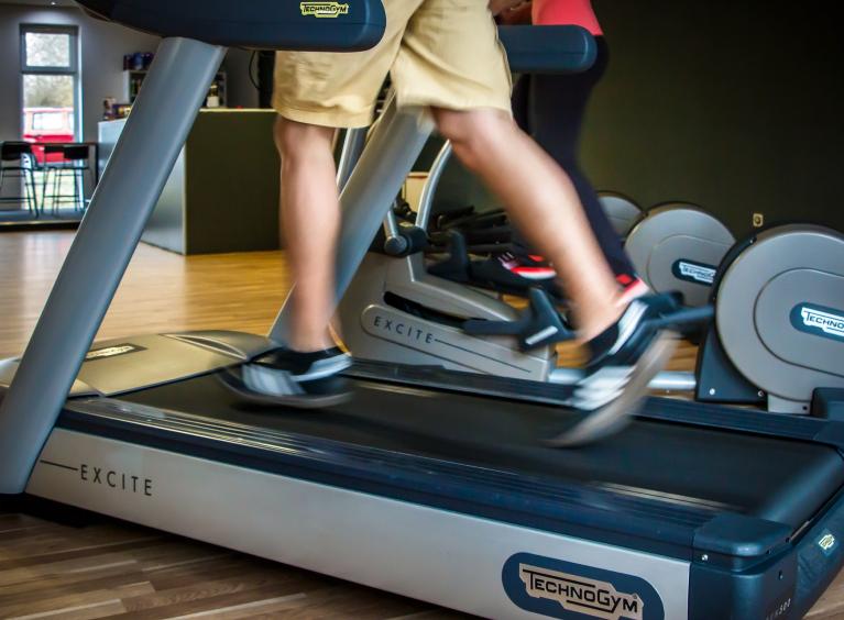 Person running on a treadmill