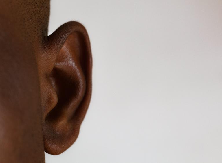 A close-up of a person's ear.