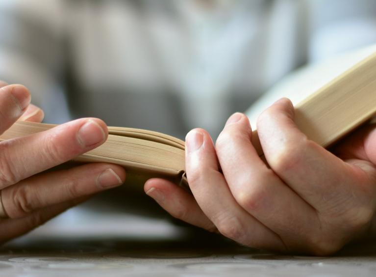 A person reading a book.