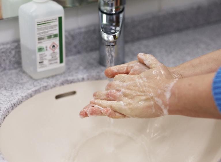 Washing hands with soap and water