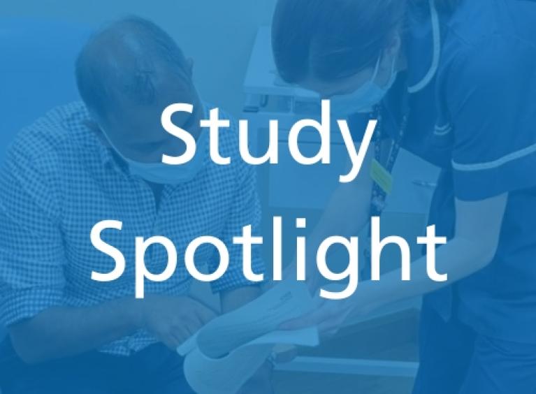two people discuss research in the background, obscured by a blue overlay, in the foreground the words 'Study Spotlight'